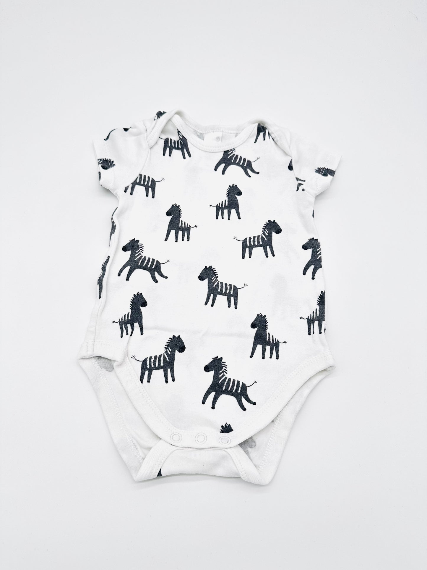 Weißer Body mit Zebra-Print - Gr. 74 (C&A)
