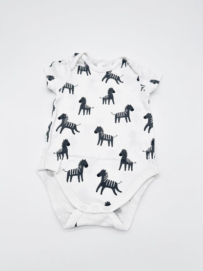 Weißer Body mit Zebra-Print - Gr. 74 (C&A)