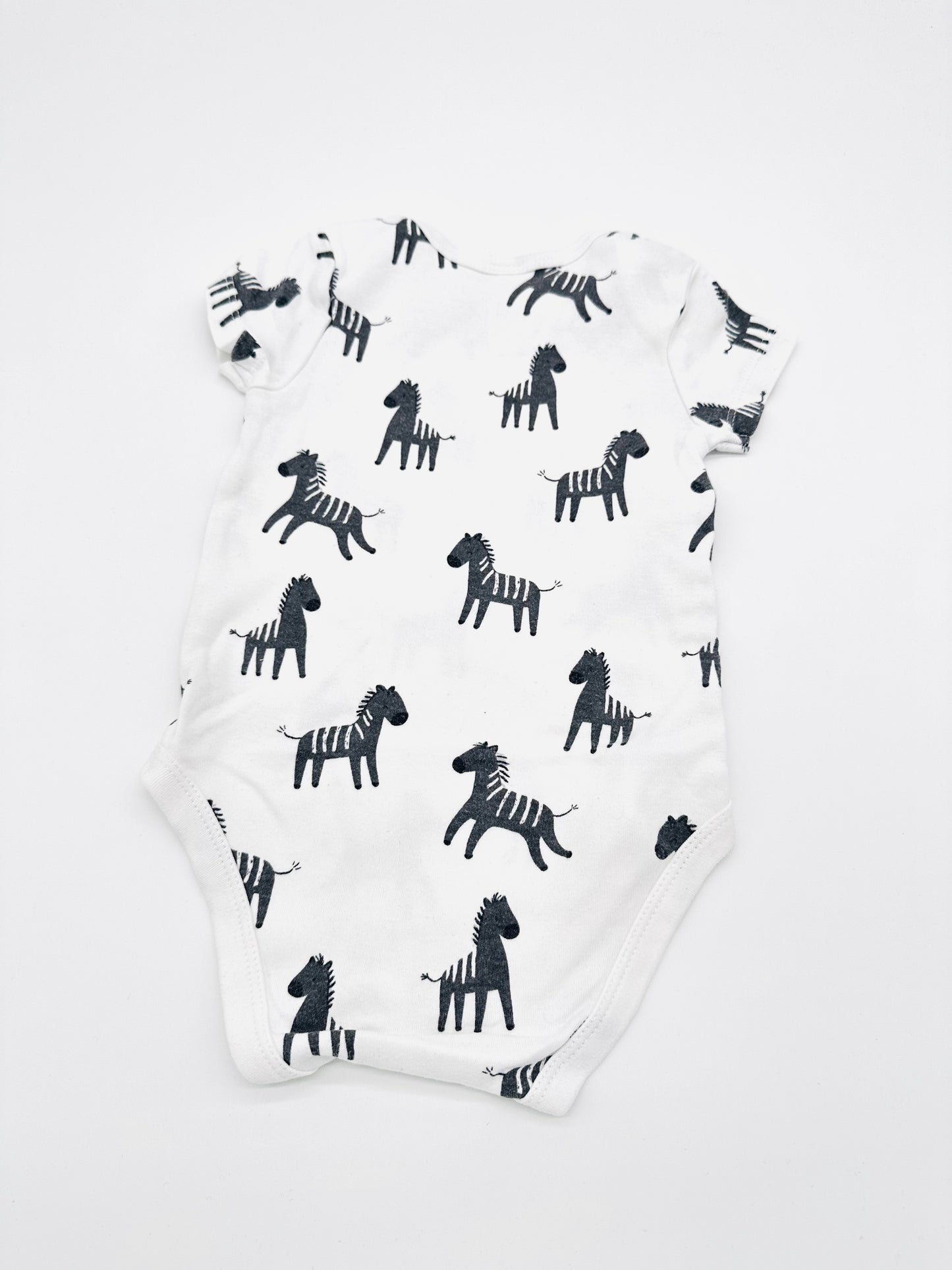 Weißer Body mit Zebra-Print - Gr. 74 (C&A)