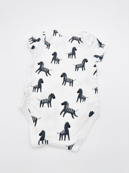 Weißer Body mit Zebra-Print - Gr. 74 (C&A)