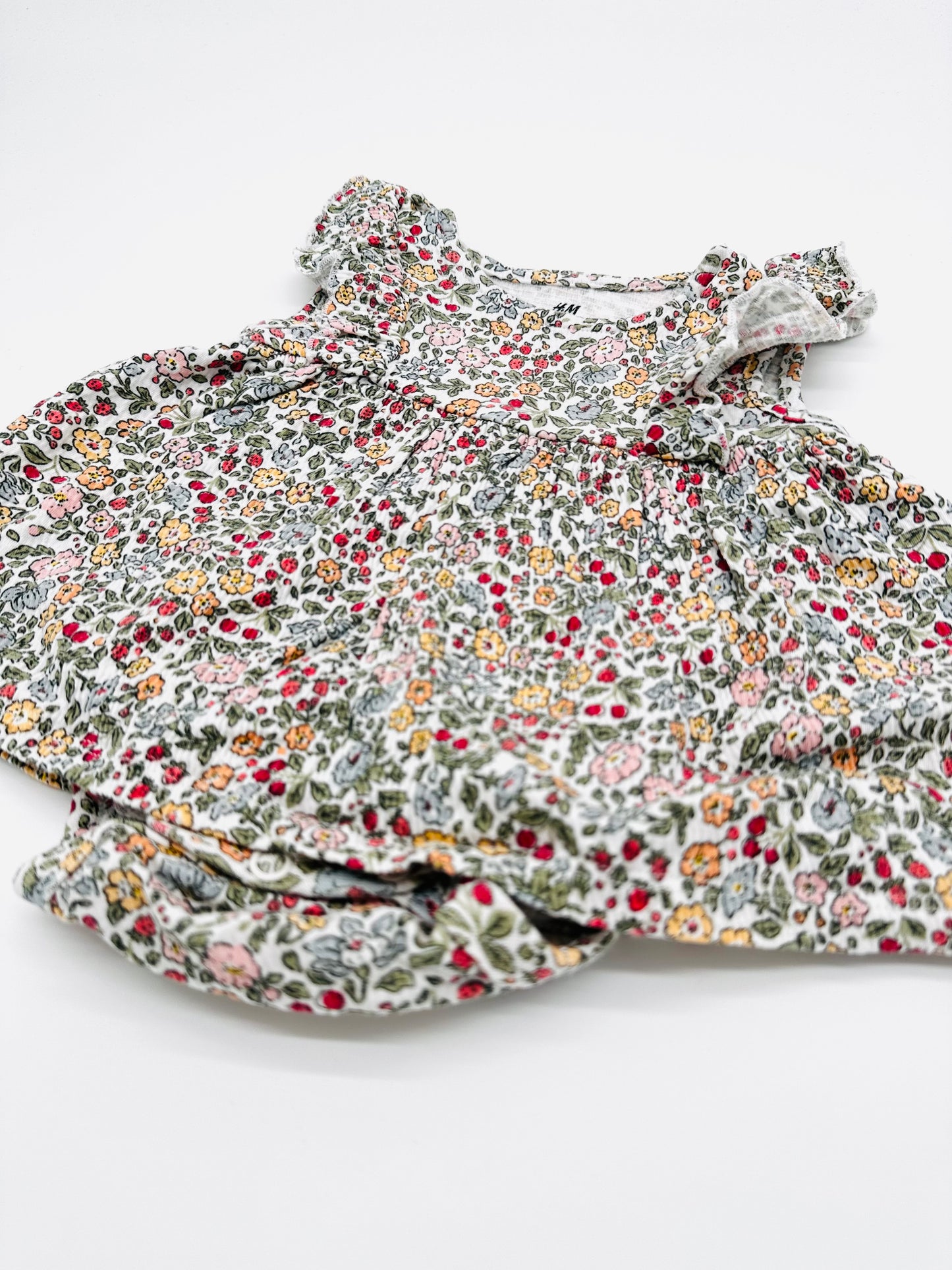 Body-Kleid mit Blumenmuster - Gr. 50 (H&M)